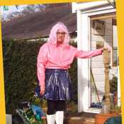 pinks plastic blouse, navvy PVC skirt amnd white PVC boots