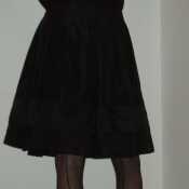 Black satin dress and seamed stockings a girls dream