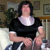 Sitting in Black Maid Uniform