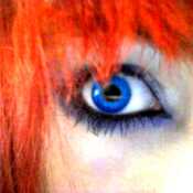 My blue eyes and red hair that looks orange in the lighting