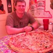 me and a really big pizza in San Antonio, Tx.