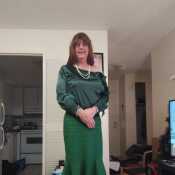 Enjoying the new blouse with a green outfit.