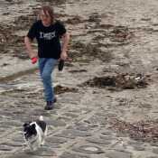 Me and the dog running on the beach...he won!