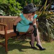 Black seamed stockings in the garden