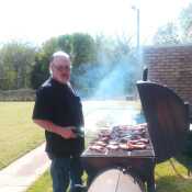 Husband barbecuing us some dinner