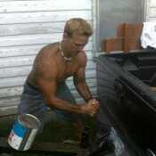 During the summer taking time to help out Dad with the rest of the roofing crew. Covered in coal dust.